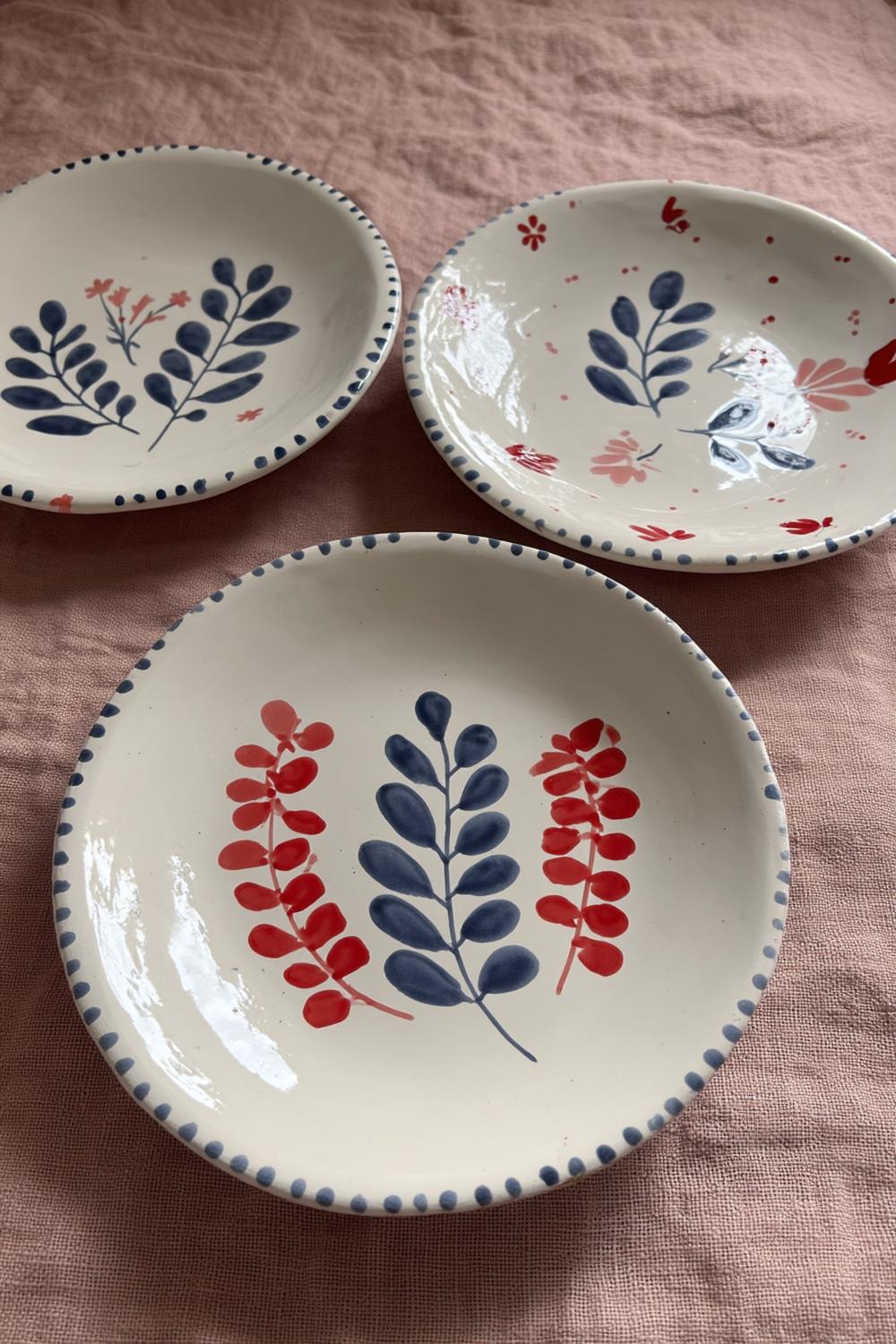 Botanische Muster in Rot-Blau